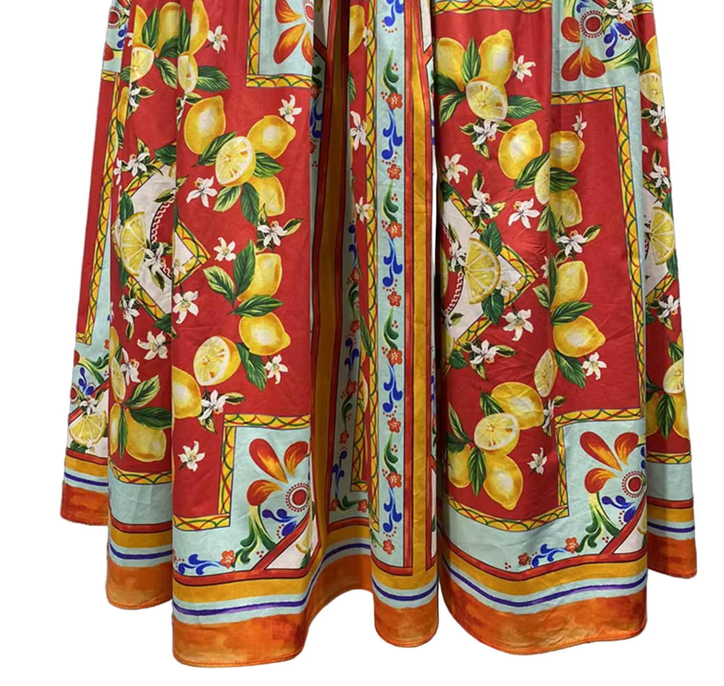 Colorful fabric with lemon and floral pattern on a textured background