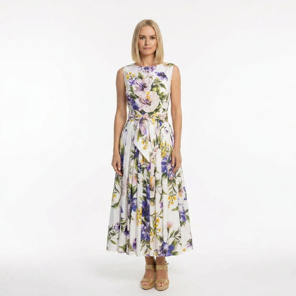 Woman wearing a floral dress on a white background