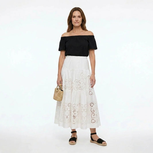 Falda midi blanca de algodón bordado inglés con cintura elástica